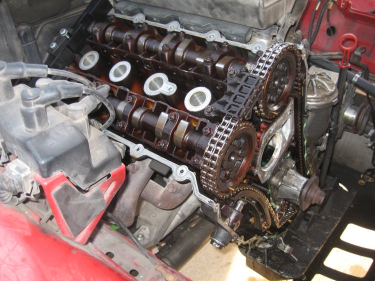 BMW E30 318iS with disassembled engine.